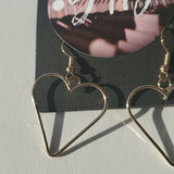 Boutique Two Pair Faux Pearl Studs and Dangle Gold Tone Heart Earrings