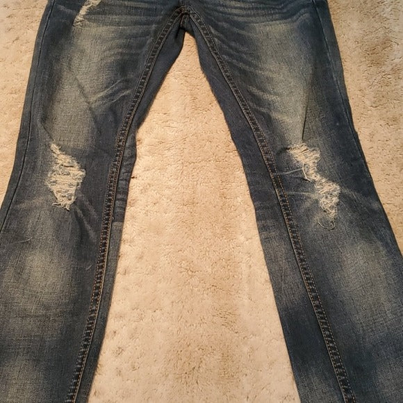 Free People Medium Wash Lower Rise Skinny Jeans Size 25